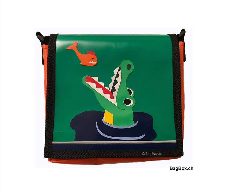 Eine handgearbeitete Kindergartentasche Krokodil. Das individuelle Geschenkt für den Kindergarteneintritt.