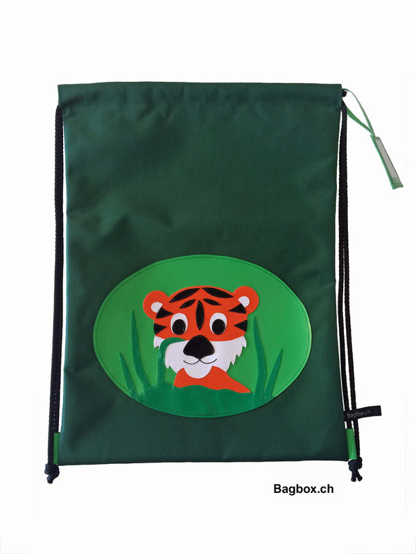 Turnbeutel aus wasserabweisendem Rucksacknylon mit Zugkordeln und Namensschild. Praktisch vom Kiga bis ca 3. Klasse oder einen Ausflug. Motiv: Tiger